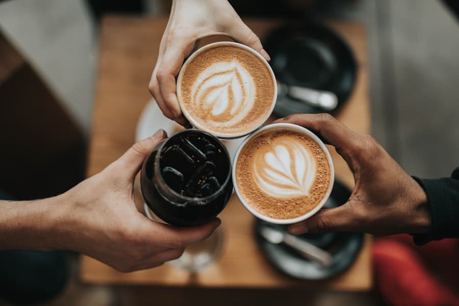 A freshly poured cup of coffee on a saucer